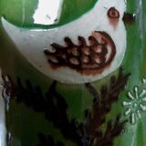Ceramic bird pitcher.