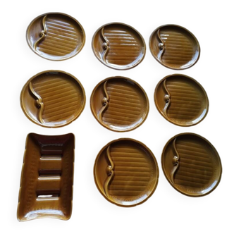 Gien plate service with a moustache design.