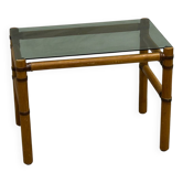 Table basse bois blond et verre fumé à ligatures cuir
