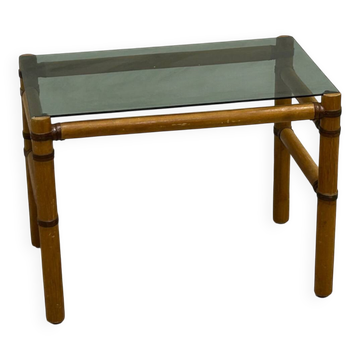 Table basse bois blond et verre fumé à ligatures cuir
