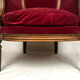 Bergère de style louis xvi garnie de velours rouge sombre, début xixe