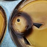 Set of ten Moulin des Loups fish plates.