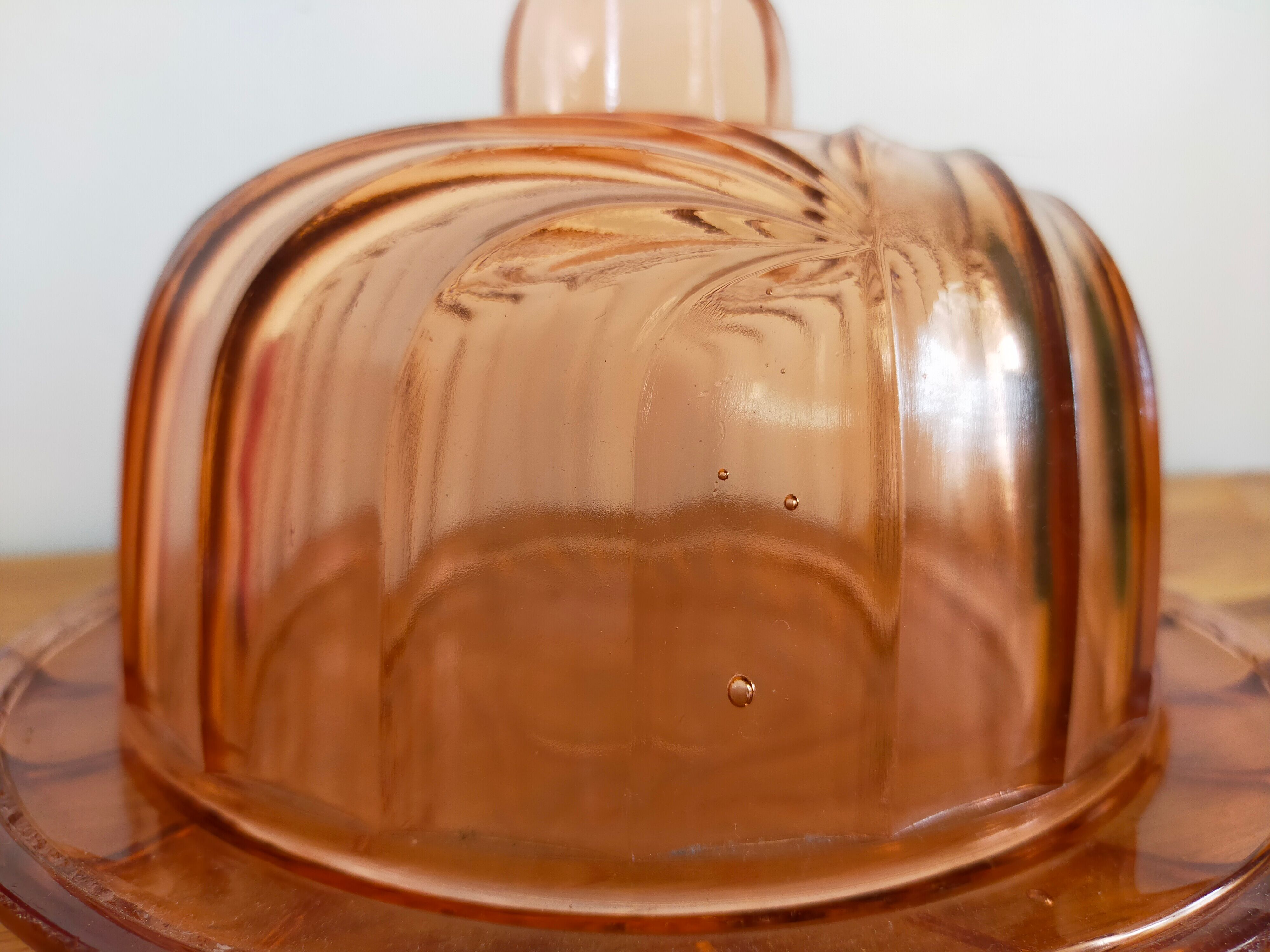 Cheese bell and vintage plate in art deco pink molded glass