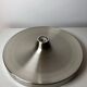 Modernist disc wall sconce