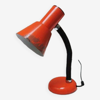 Old orange enameled sheet metal lamp