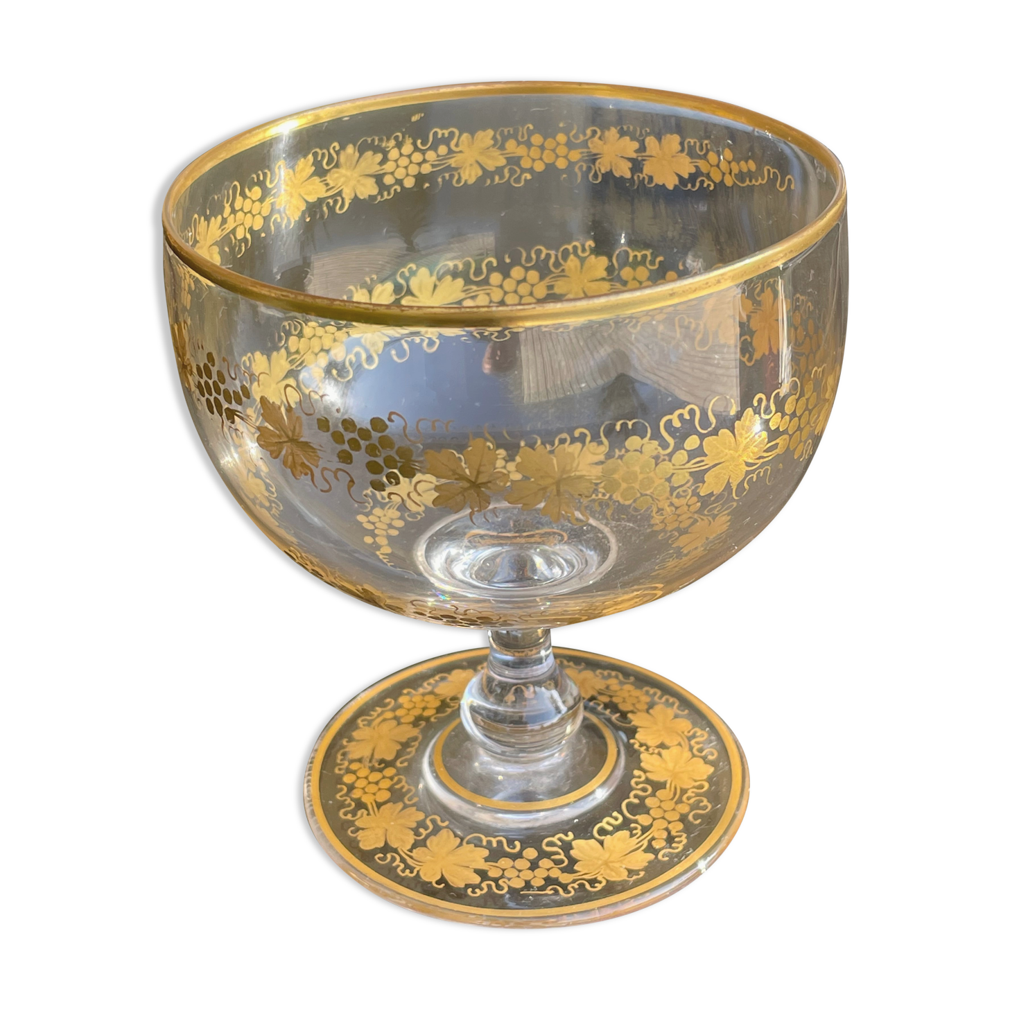 Glass cup decorated with golden vine decoration