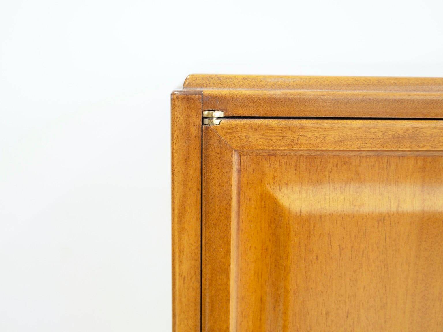 Large Swedish mahogany storage unit with four front doors.