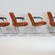 4 "space age" armchairs, chrome steel base