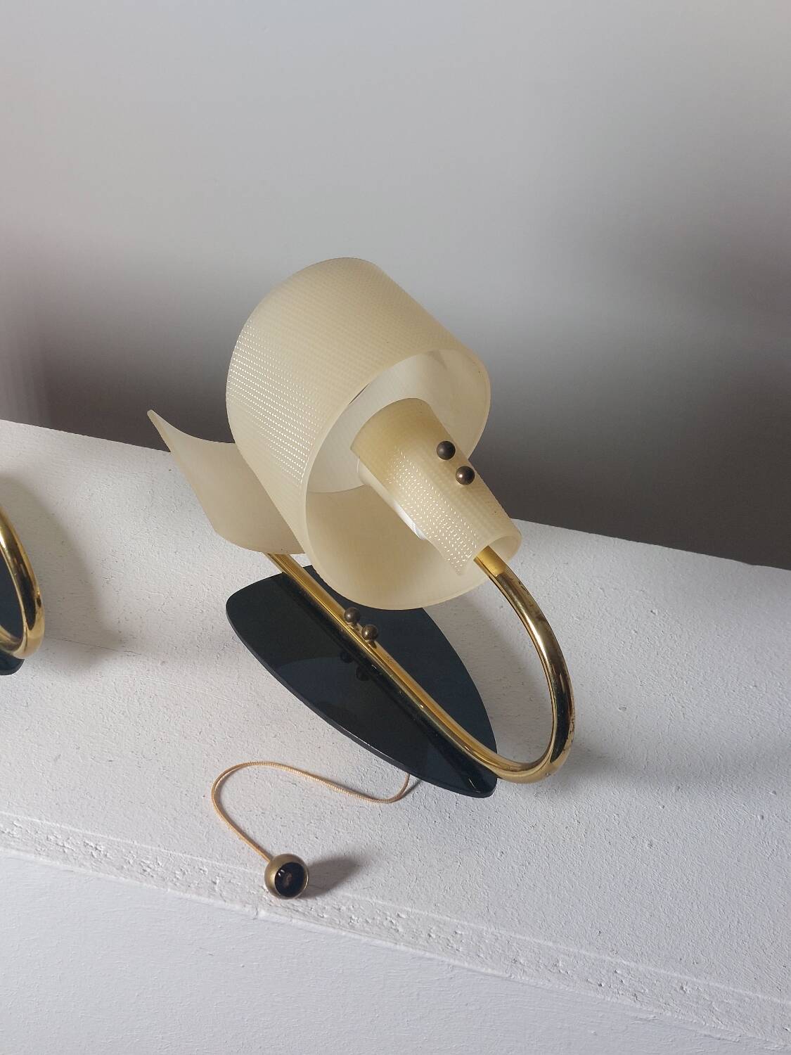 Pair of vintage wall lamps from the 1950s in brass.