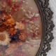 Herbier ovale vintage en laiton