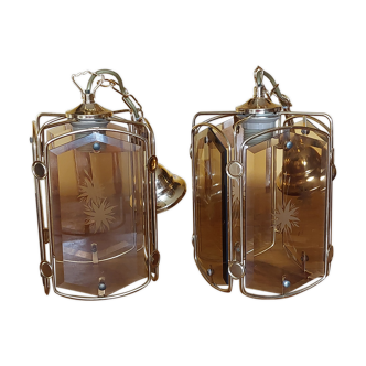 Pair of chandeliers in gilded brass and smoked glasses, year 1980/90