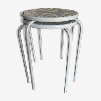 Pair of perforated metal stools at the end of 1970