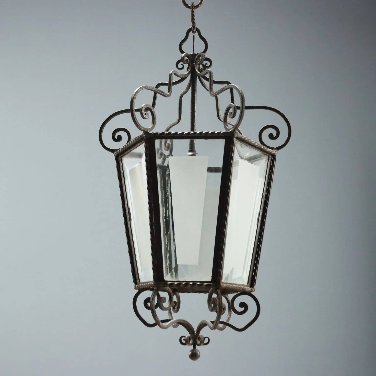 Old iron and glass lanterns, Italy, early 20th century.