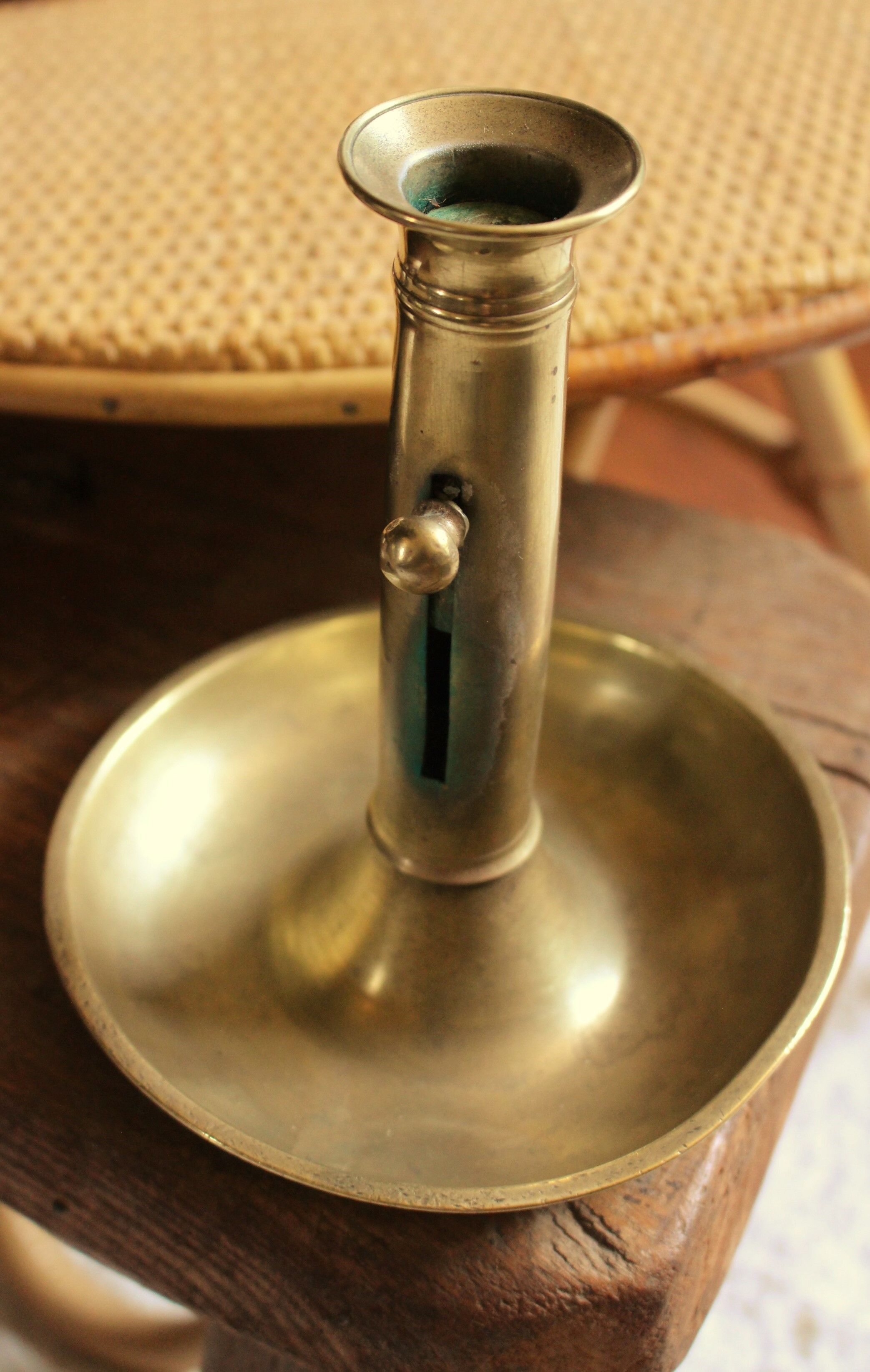 Brass pusher round cut candle holder