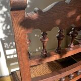 6 carved wooden chairs with cane seats