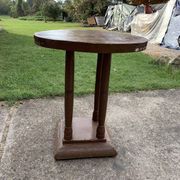 1930s Art Deco round side table in painted brown wood — column leg base