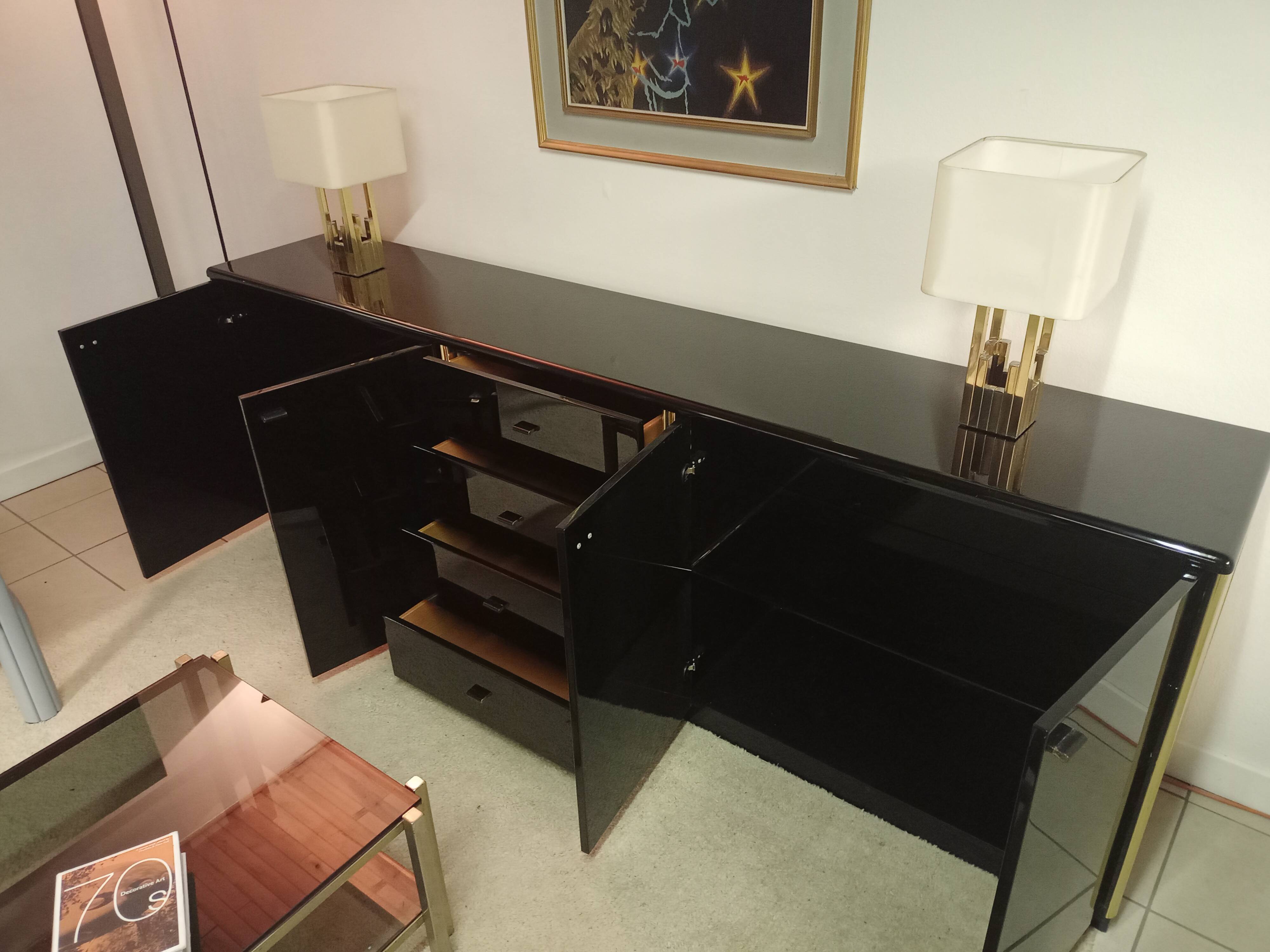 Black lacquered and brass design 70/80