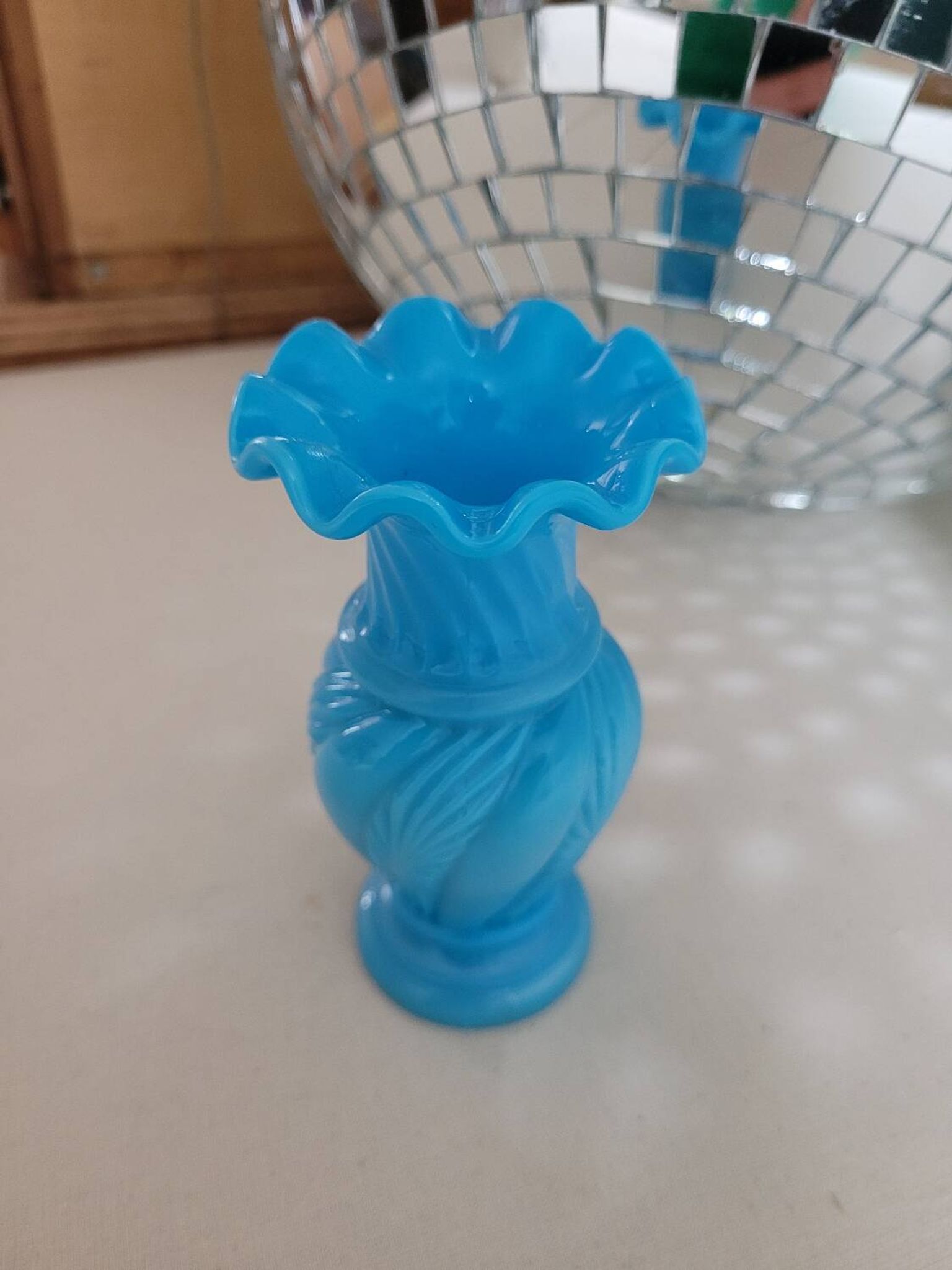 Lace-edged blue opaline vase