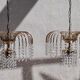 Paire de lustres perlés d’or italien vintage
