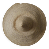 Hand-woven wicker straw hat, artisanal production, decorative object, bohemian ethnic countryside