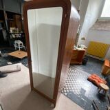 Pair of rounded mirrored wardrobes