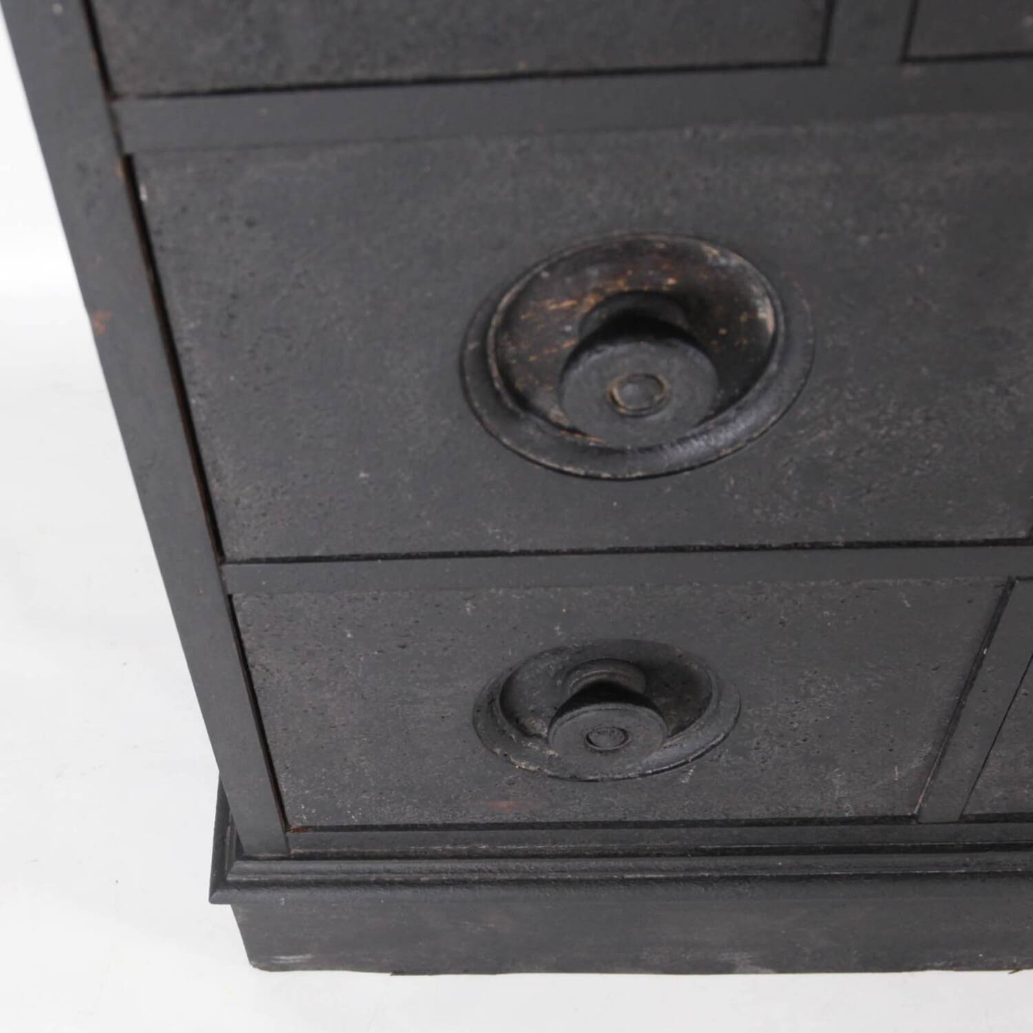 Blackened wooden chest of drawers