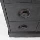 Blackened wooden chest of drawers