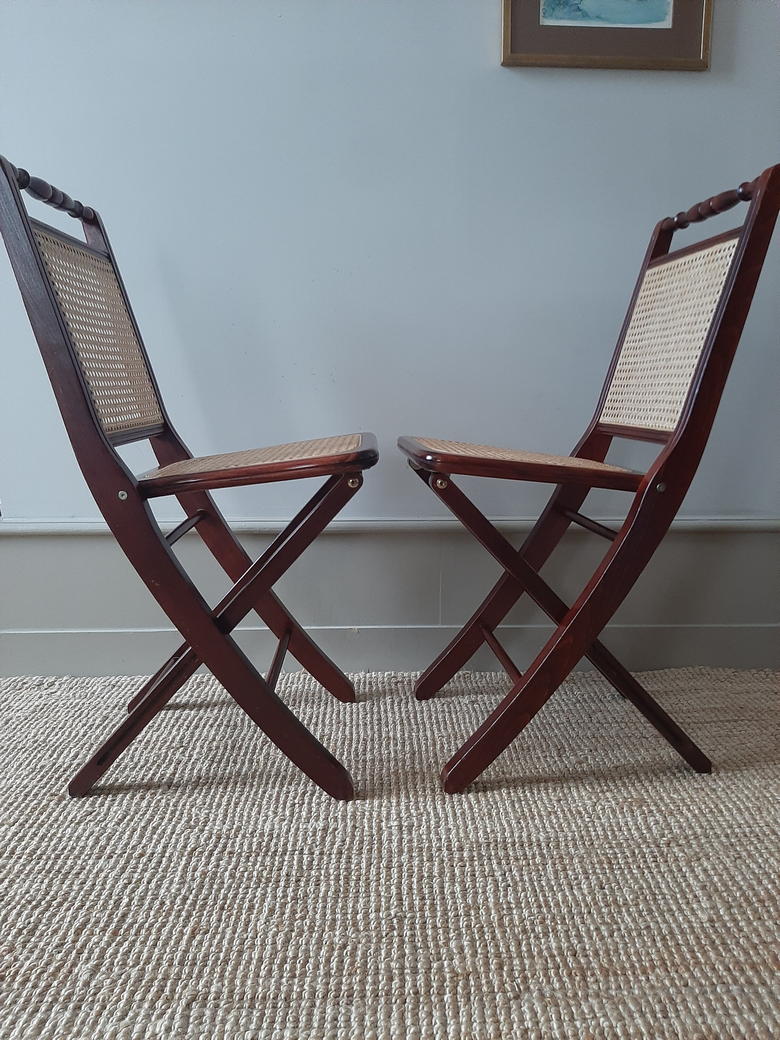 Folding wooden chairs and cannage