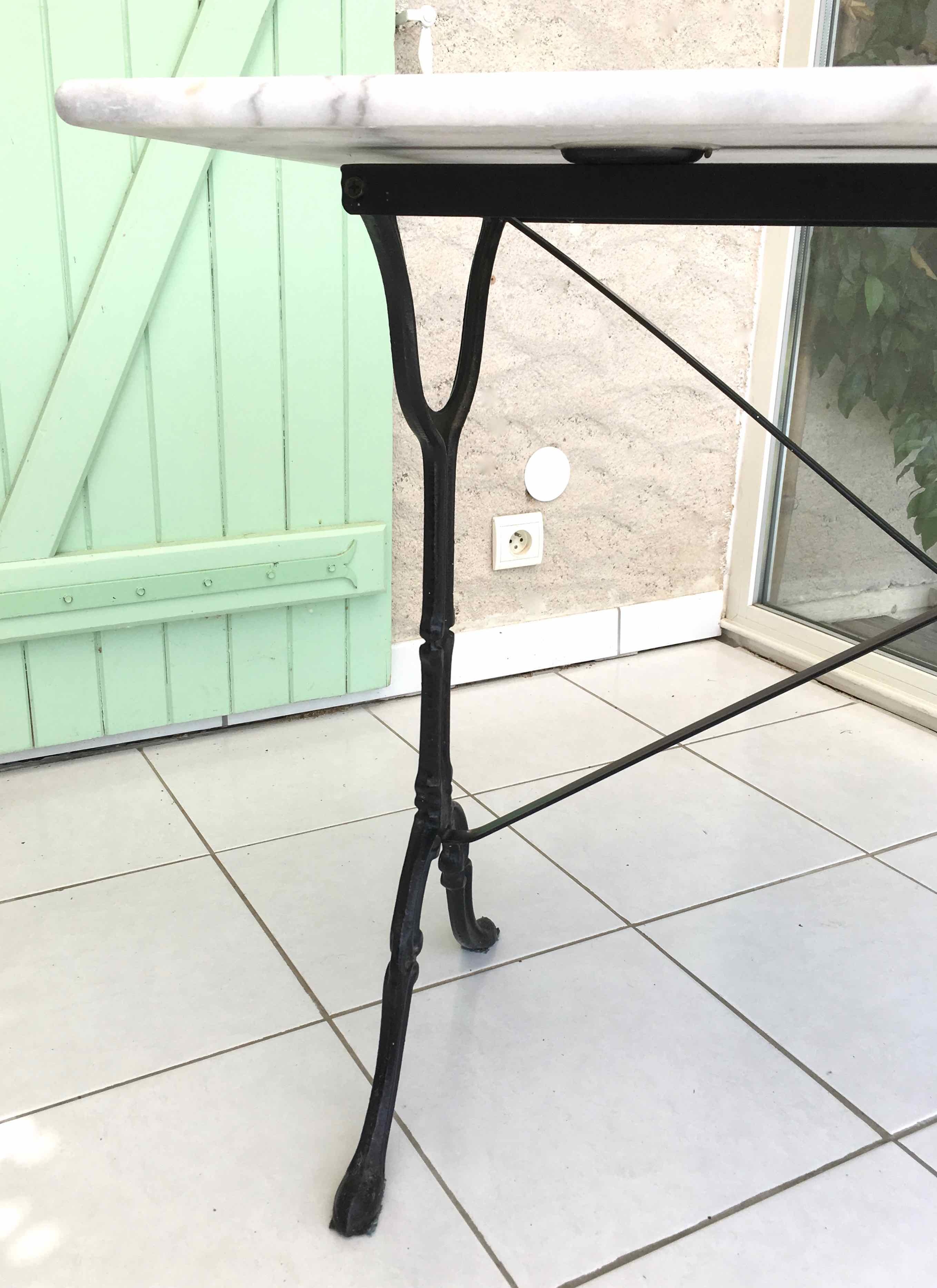 Marble and cast iron bistro table