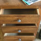 Old blond wooden chiffonnier