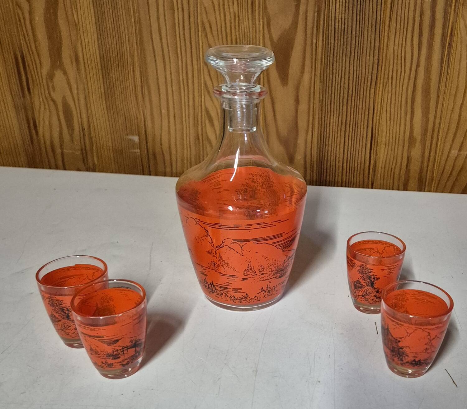 Decorated glass liqueur set, carafe and 4 glasses with asian scene