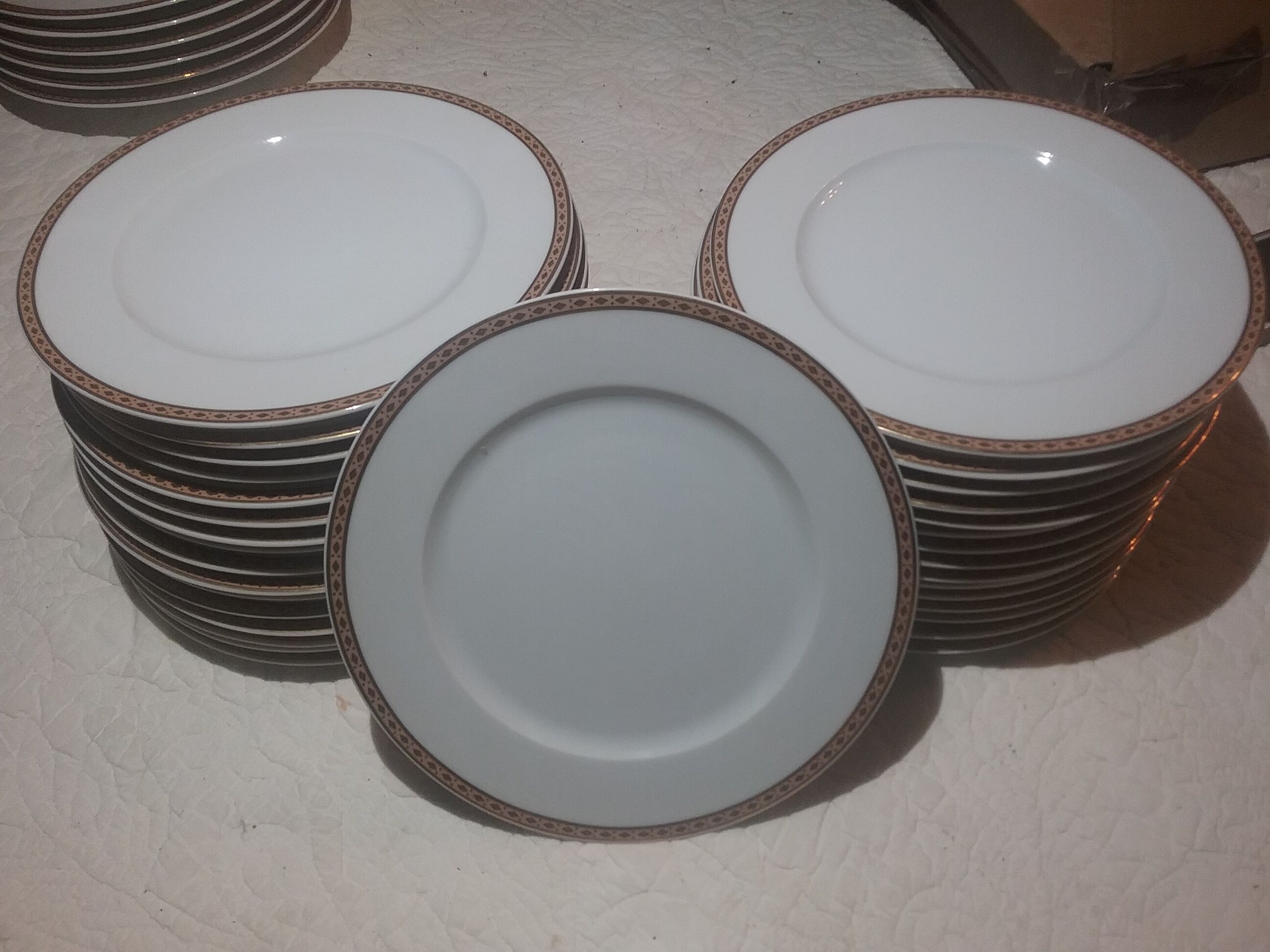 Fine porcelain dessert plates with gilded edging