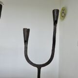 Pair of antique wrought iron candlesticks