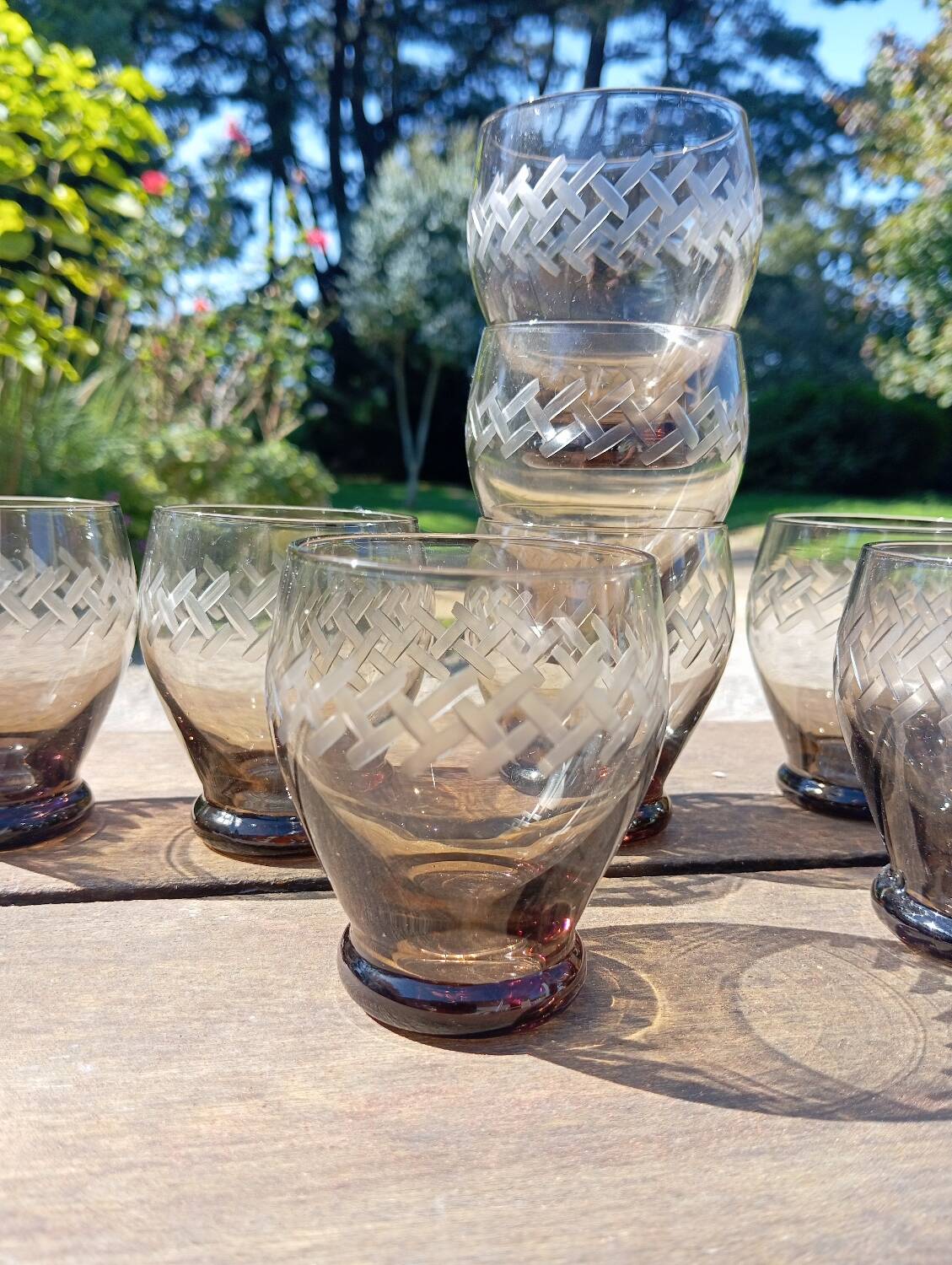 Set of 9 digestive glasses, smoked glass cut in art deco style