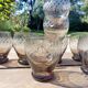 Set of 9 digestive glasses, smoked glass cut in art deco style