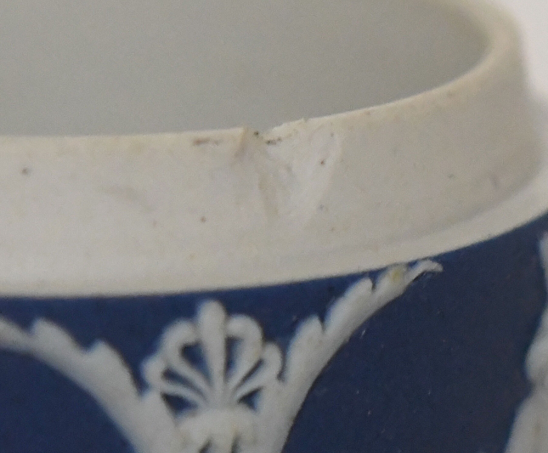 Pair of Wedgwood biscuit boxes with relief decoration of antique scenes