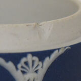 Pair of Wedgwood biscuit boxes with relief decoration of antique scenes