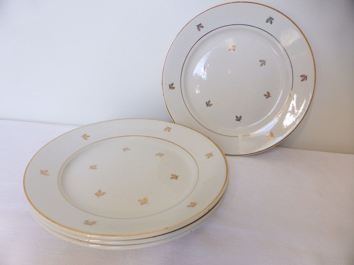 Set of 4 vintage flat plates in Badonviller porcelain