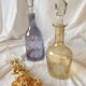Carafe jaune en verre ciselé