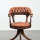 Classic and timeless cow leather and wooden Chesterfield office chair
