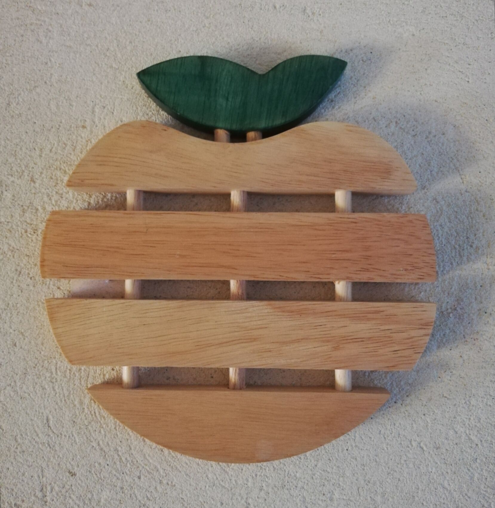 Wooden underside of apple shape