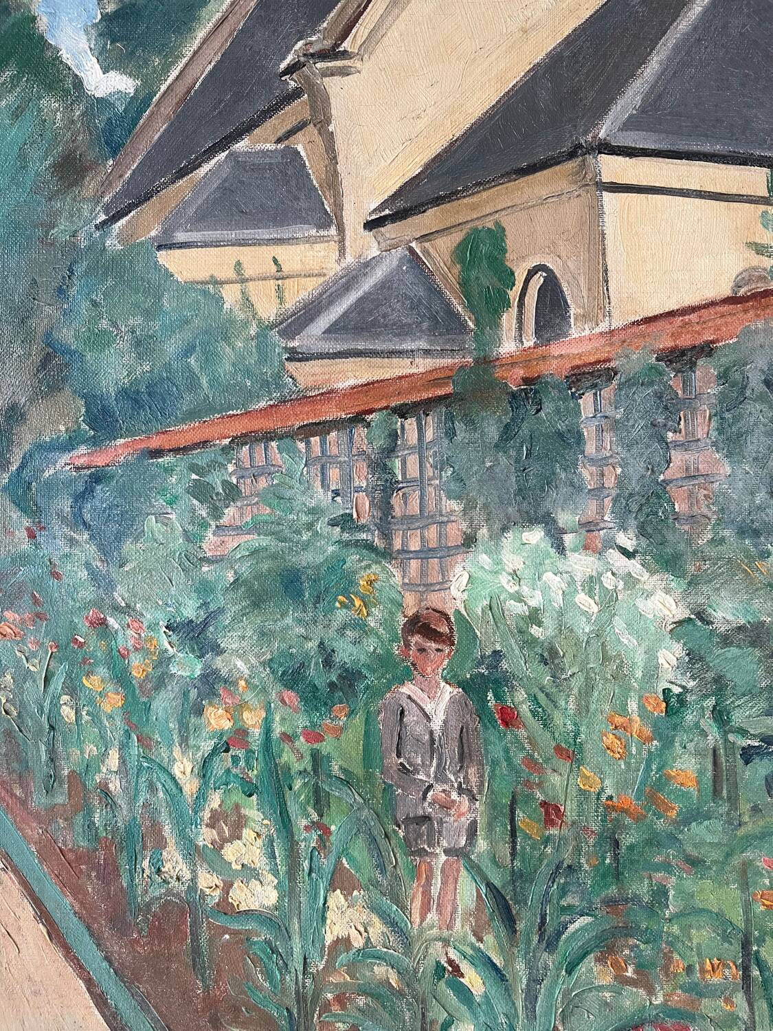 Country house with young man, signed Bernard Delafon