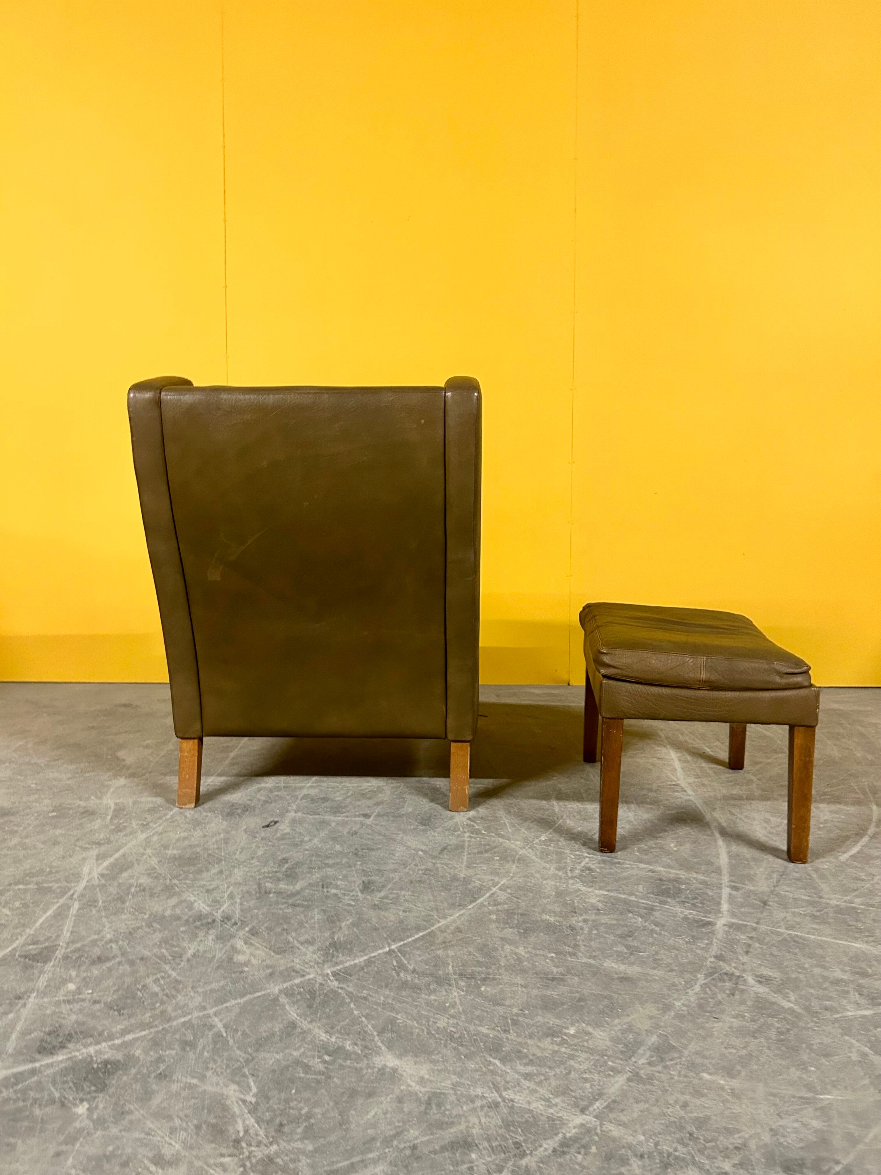 Fauteuil en cuir vintage danois à dossier haut années 1960