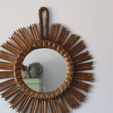 Old large sun mirror in gilded wood