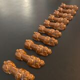 10 ceramic knife holders in the shape of a recumbent poodle