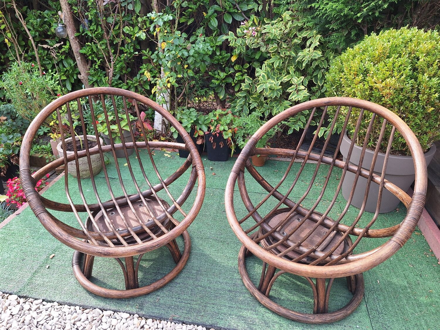 Pair of vintage rattan swivel armchairs
