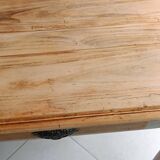 Antique wooden desk with a patinated base