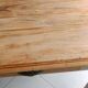 Antique wooden desk with a patinated base