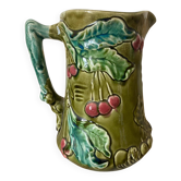 antique jug in slipware with cherry decoration