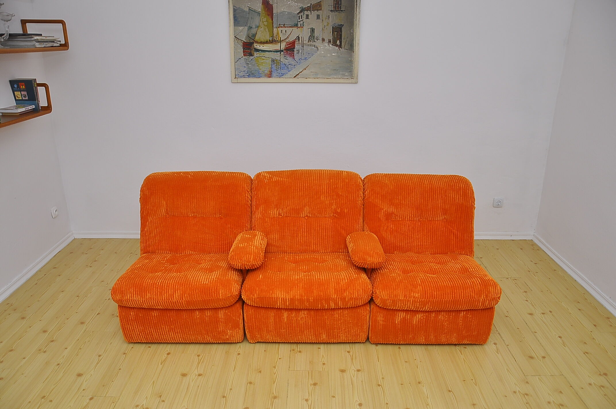 Orange corduroy modular sofa, 1970s.